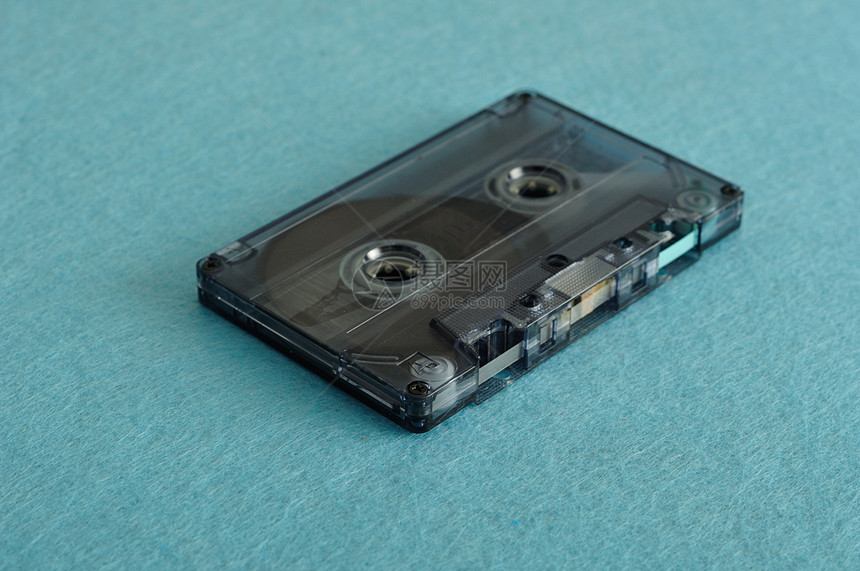 复古的蓝色背景旧磁带盒式录音塑料袖珍的图片