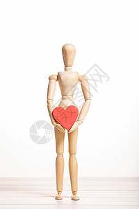 木制的人体模型惊喜配有红心爱概念的Woodenmannequin情人约会卡图片