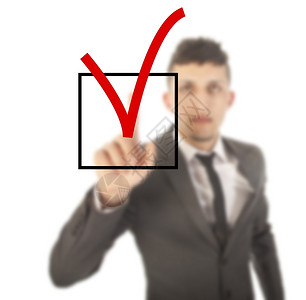 民意调查考试年轻商人用白色背景孤立的复选框手图片