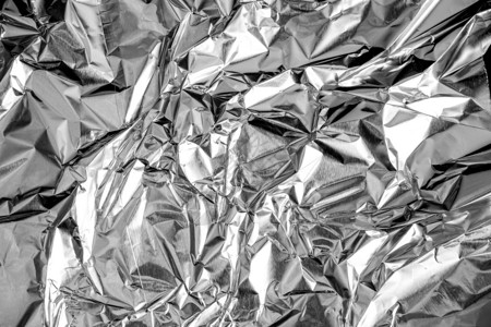 材料折叠挫败铝箔皱巴的银质感抽象背景高清图片