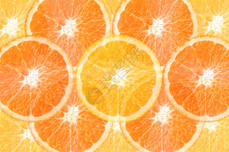 橙子切片作为背景品尝甜的成熟背景图片