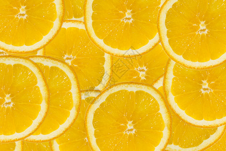 黄色甜橙酸的甜橙片柑橘水果的简要背景摘近身健康食品背景情况摄影室柠檬背景