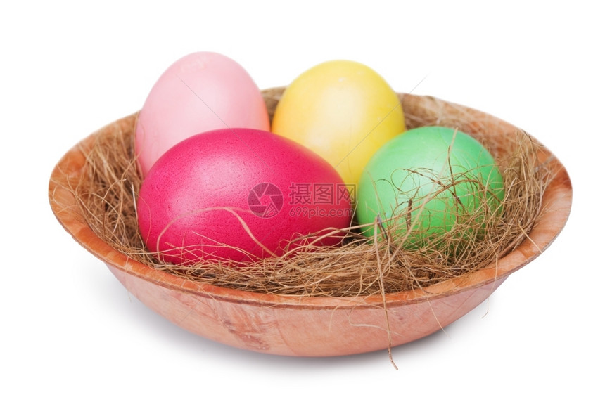 克罗波托夫庆典杂色多复活节鸡蛋在白背景上孤立的巢中图片