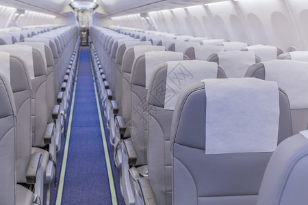 客机座位天空飞机座椅和灯光的视图旅游喷气客机背景