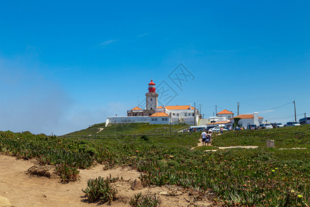 欧洲大陆在西洋的点CabodaRoca夏季雾中葡萄牙岬天空图片