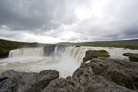 弗洛伦萨冰岛的戈达福斯瀑布是冰岛最壮观的瀑布之一Skjalfandafljot的水从12米高处掉落下来宽度为30米急流斯佳凡达弗洛特电流背景