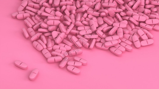 粉色背景上的药物图片