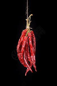 挂起来的红辣椒背景图片