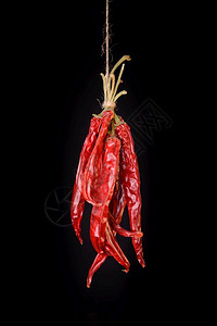 挂起来的红辣椒背景图片