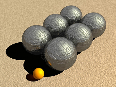 杰克法国6个大金属平方石球和1个小橙子插在沙滩上Petanque游戏球阴影金属的高清图片素材