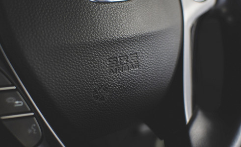 皮革SRS豪华轿车方向盘上的气袋图标车轮汽图片