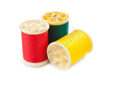 纺织品纤维目的白色背景上红黄绿线图片
