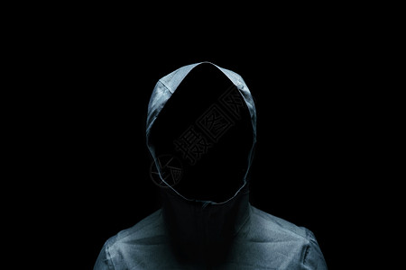 阴影神秘黑背景蒙面的隐形人身戴黑底头罩的肖像缠扰者设计图片