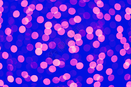 光学的近粉红色和蓝模糊光背景散焦闪粉红色和蓝模糊光背景电灯泡图片