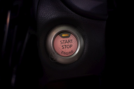 现代的用橙色灯光汽车部件概念启动汽车引擎按钮的离开替代图片