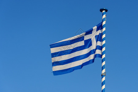 旗杆希腊的在蓝天背景下挥舞希腊旅行手横幅背景