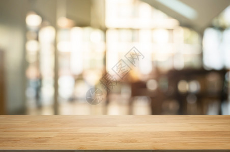 咖啡厅桌面咖啡厅背景模糊的混合咖啡店空木制桌餐厅背景房间木板家设计图片