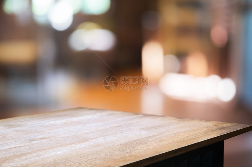 优质的广告厨房颜色模糊的空木制表格餐饮背景图片