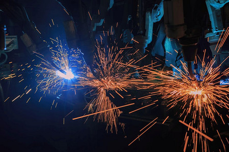 制造业激光团队机器人焊接正在维修汽车部件iv工厂火花图片
