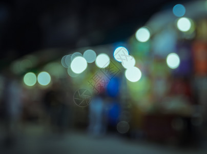 泰国水上集市黄色的购物复古游客在夜间市场行走的模糊形象设计图片