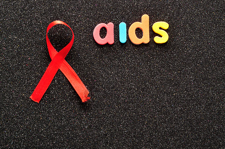 慈善机构使用红色宣传带的单词辅助工具疾病图片
