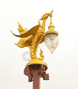 佛教徒金的白色背景上带光的金鸟装饰工艺亚洲人高清图片素材