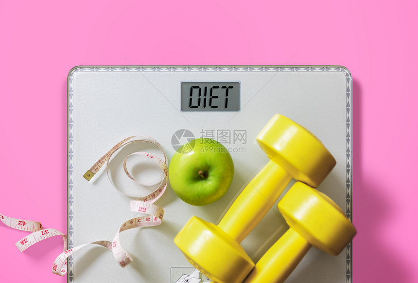 绿色胶带活力水果哑铃和比例脂肪燃烧和体重减肥概念饮食图片