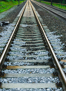 连接交通和旅行背景的长铁路连轨车道火车图片