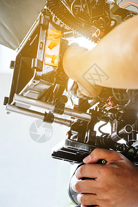 工作室镜片全体人员具有专业摄影机背景的电拍摄图片