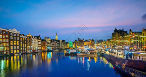 镇海岸城市景观阿姆斯特丹市下城天线日落时荷兰的城市风景图片