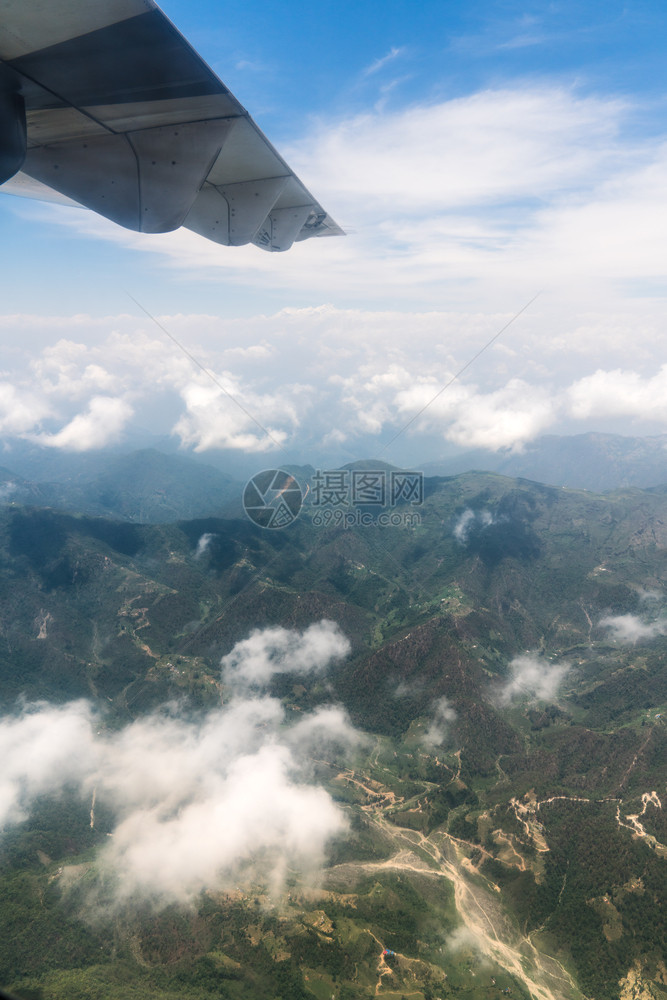 亚洲人高的飞行尼泊尔和喜马拉雅山风景观从飞机到尼泊尔的旅游和行图片