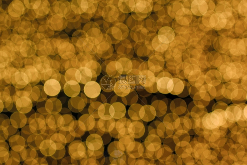 圣诞节簇戒指抽象的金色布基作为背景或纹理图片