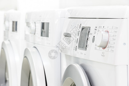 对讲控制面板关闭新的白色洗衣机或有选择地将重点放在洗衣机控制元件板上对洗衣机控制面板进行有选择的侧重器具机装载背景