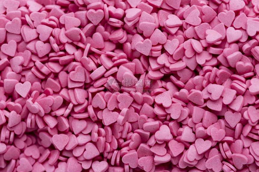 情人节粉红甜点形状的色糖果成形象征图片