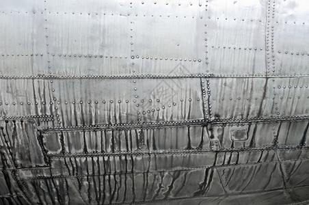 有质感的建造银飞机金属覆盖板材背景的钢制侧平台布图背景图片