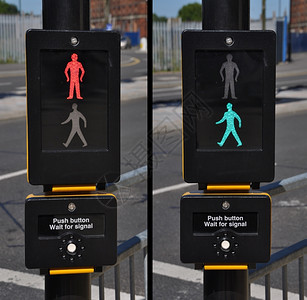 韵律赞同上市行人交通灯红色和绿步行标志路面背景图片