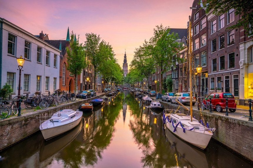 欧洲的阿姆斯特丹市下城天线日落时荷兰的城市风景阿姆斯特尔旅行图片