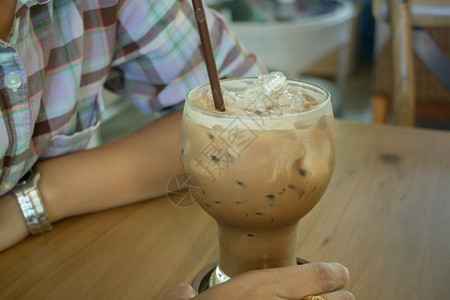 冰牛奶咖啡手股票照片玻璃喝背景图片