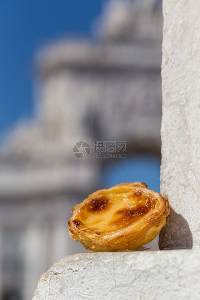 曲奇饼巴斯德关于葡萄牙里斯本背景点的葡萄牙传统鸡蛋甜饼糕点Pasteisdenata葡萄牙里斯本纪念碑图片