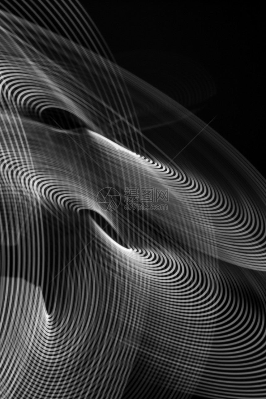 黑色背景下LED灯光的模糊抽象线条显示的波动湍流质地快速图片