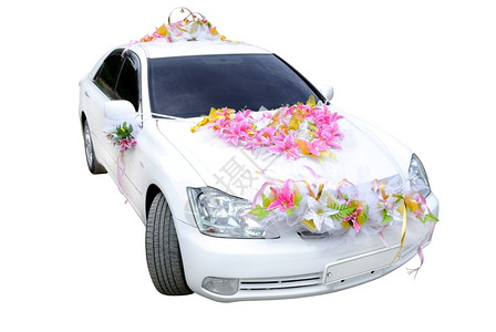 个车轮已婚白色的结轿车装饰着白色背景的鲜花图片