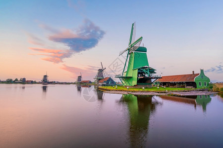 荷兰阿姆斯特丹日落时荷兰阿姆斯特丹传统古老村庄风车达屈历史水图片
