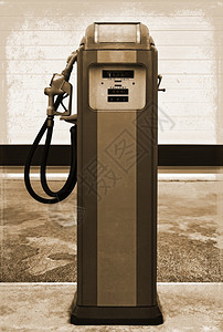旧加油站设置时的老式汽泵危机古老的复背景图片