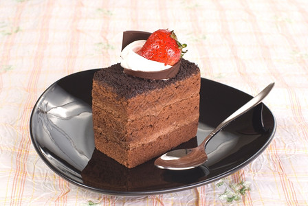 一块巧克力蛋糕美味的高清图片素材