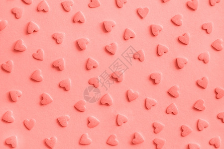 半调图案爱情浪漫图案粉色糖果心洒在背景质感珊瑚色调粉糖果心洒在质感珊瑚调装饰风格面包店生日背景