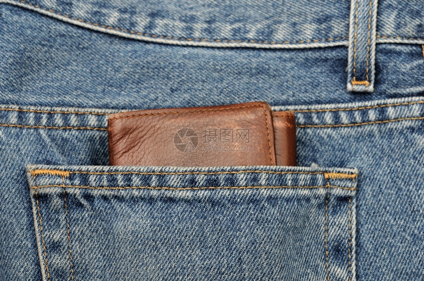 一种金属的干净蓝色牛仔裤后口袋有扳手机械图片