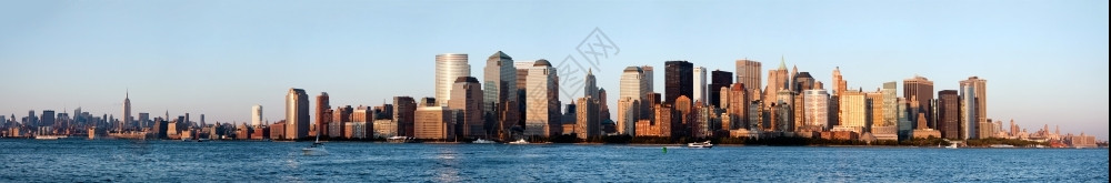 纽约市曼哈顿天际线全景显示金融区与世界贸易中心WTC位于市中心城与帝国大厦位于市中心金融的高楼建造建筑物高清图片素材