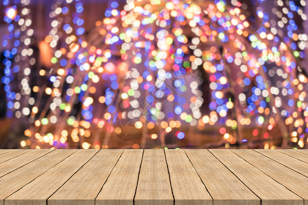 圣诞节彩色模糊背景的木板表顶上用于调假产品的空间城市餐厅图片
