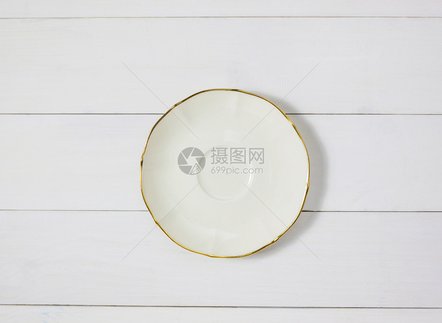 白色的干净木桌背景上空的陶瓷圆板面最佳图片