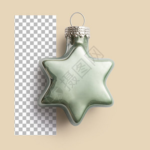 用于圣诞节装饰的绿色恒星泡玩具冬天云杉图片